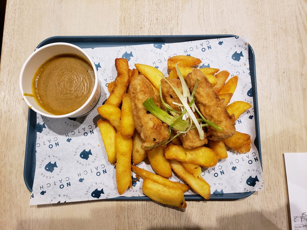 Battered sausage with chunky chips and curry sauce