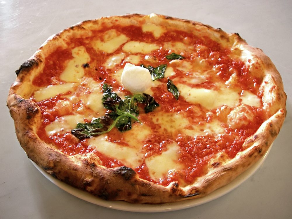 Freshly baked margherita pizza